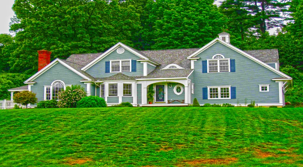 House with blue-grey exterior siding and white trim
